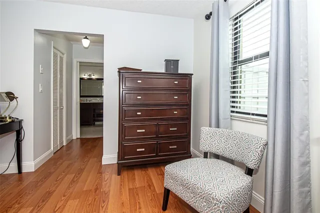 an aerial view of residential houses with outdoor space and swimming pool