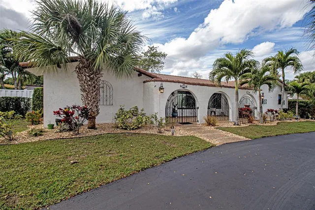 a view of a dining room with furniture and window