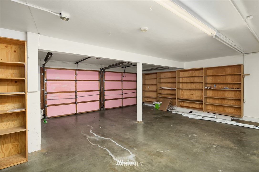21900 Meridian Avenue South Bothell, WA 98021 - Photo 15 of 20 a view of an empty room with furniture and storage