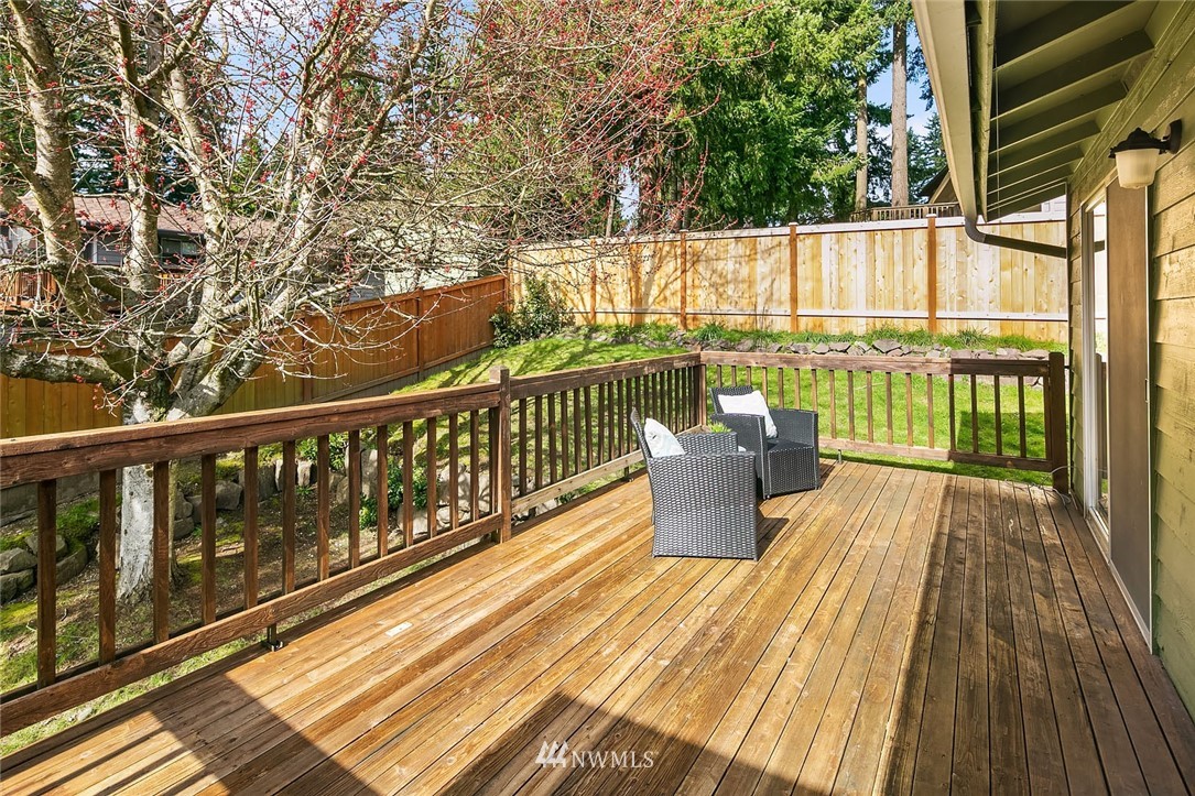 21900 Meridian Avenue South Bothell, WA 98021 - Photo 18 of 20 a view of balcony with wooden floor and fence