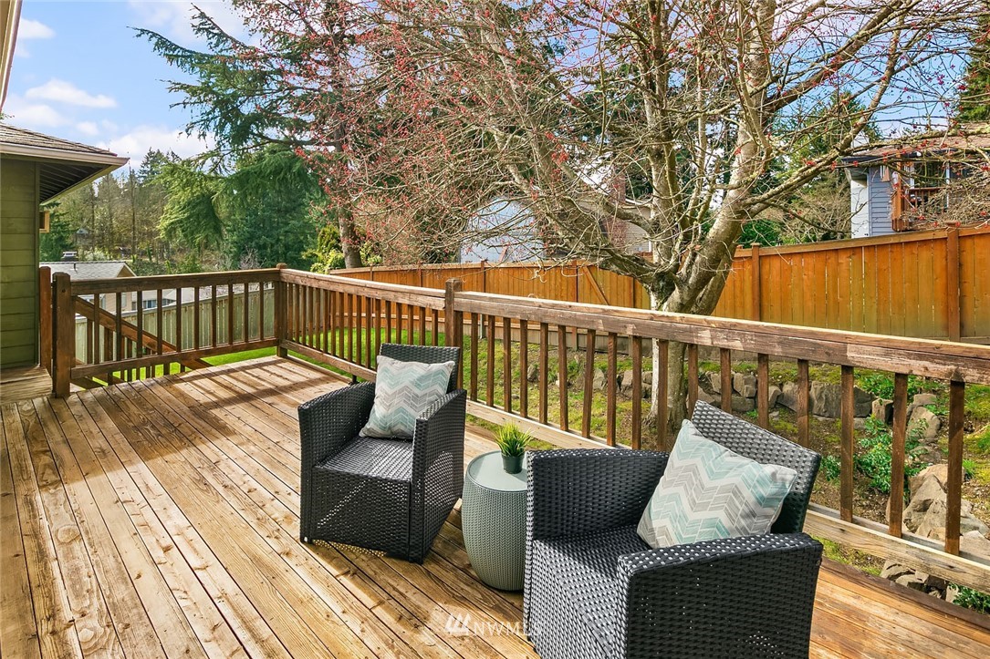 21900 Meridian Avenue South Bothell, WA 98021 - Photo 19 of 20 a view of a wooden deck with furniture