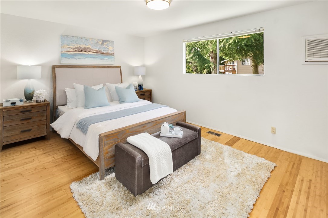 21900 Meridian Avenue South Bothell, WA 98021 - Photo 7 of 20 a bedroom with bed and a window