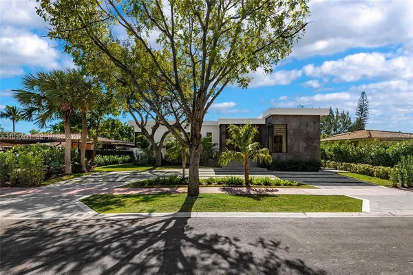 a view of a playground with basketball court