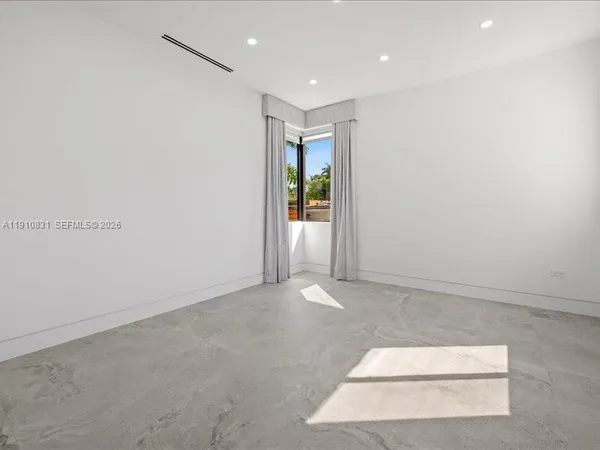 a view of an empty room with window