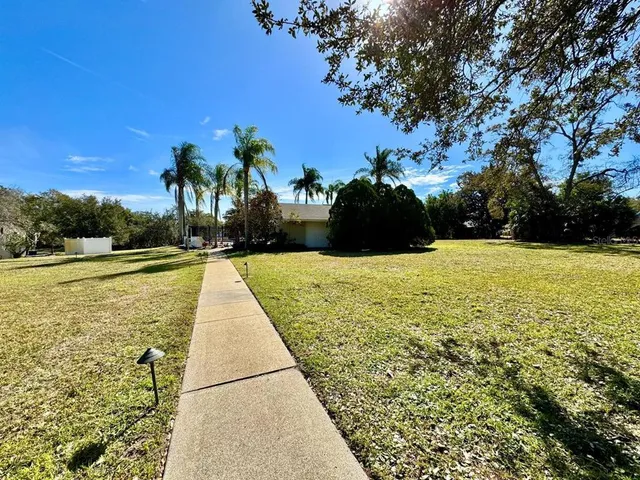 a view of swimming pool with garden