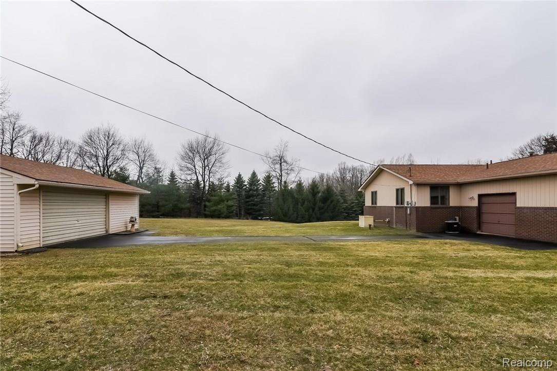 200 Mack Road Leonard, MI 48367 - Photo 33 of 42 Backyard.jpg