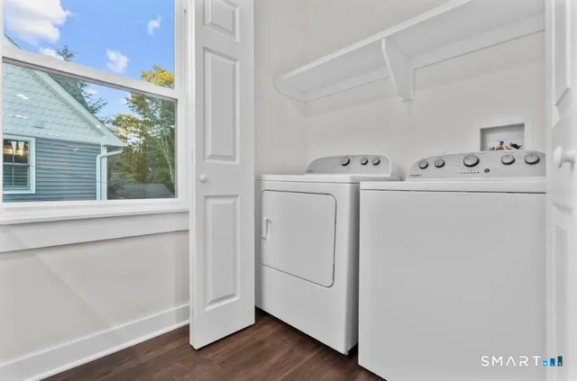 a utility room with dryer and washer