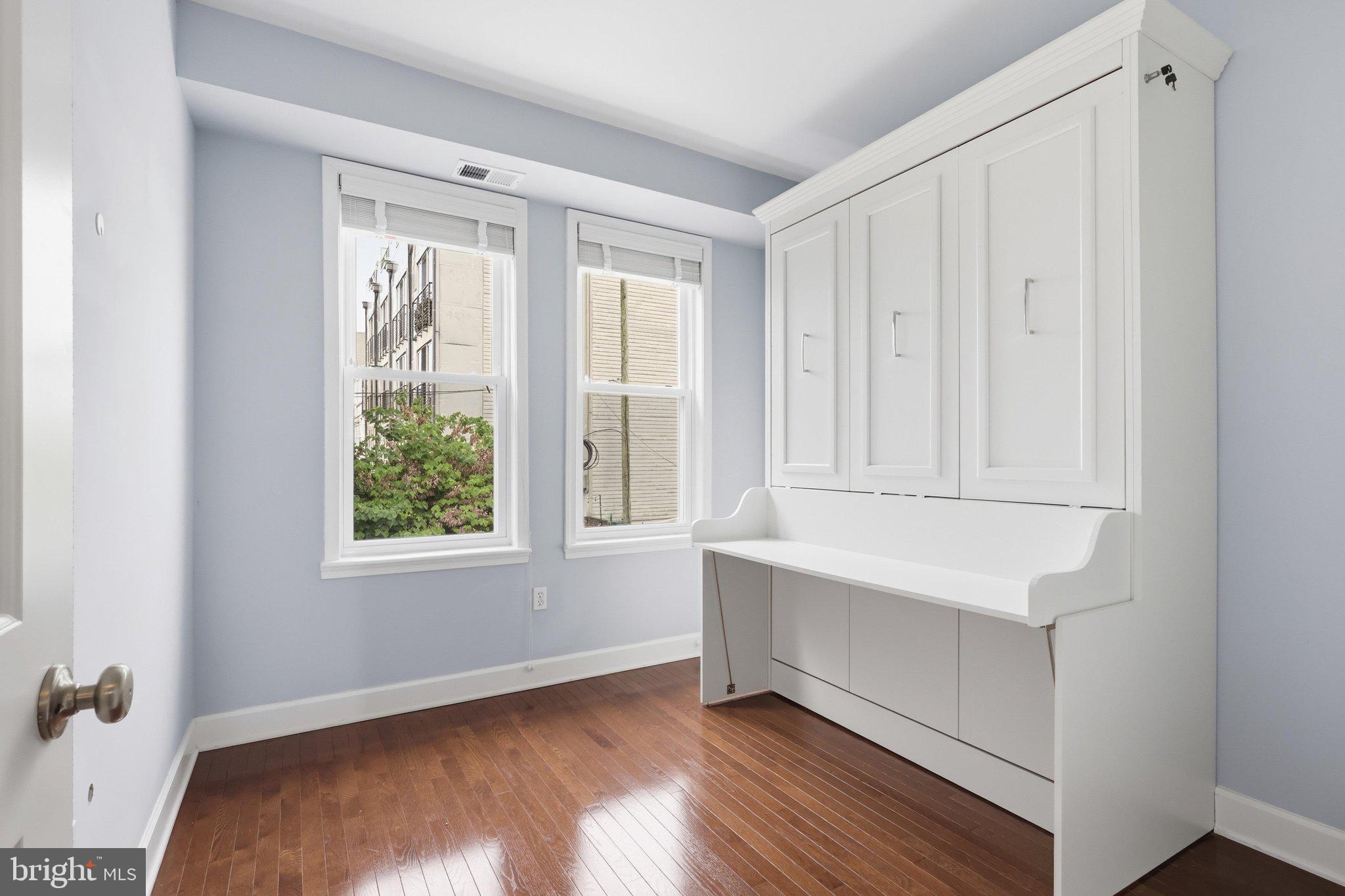 1710 3rd Street Northeast Washington, DC 20002 - Photo 23 of 49 Murphy bed/desk optimizes space in bedroom 3