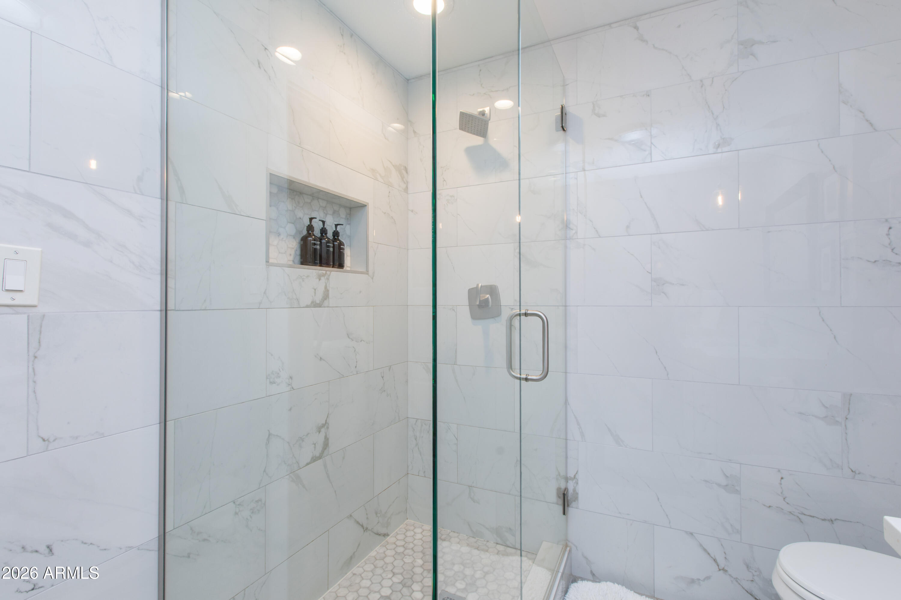 5541 East Cheery Lynn Road Phoenix, AZ 85018 - Photo 34 of 69 a bathroom with a shower and toilet