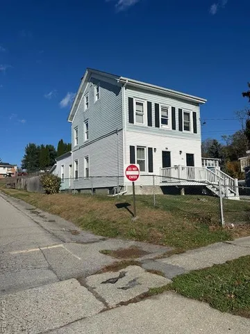 a view of residential houses with city street