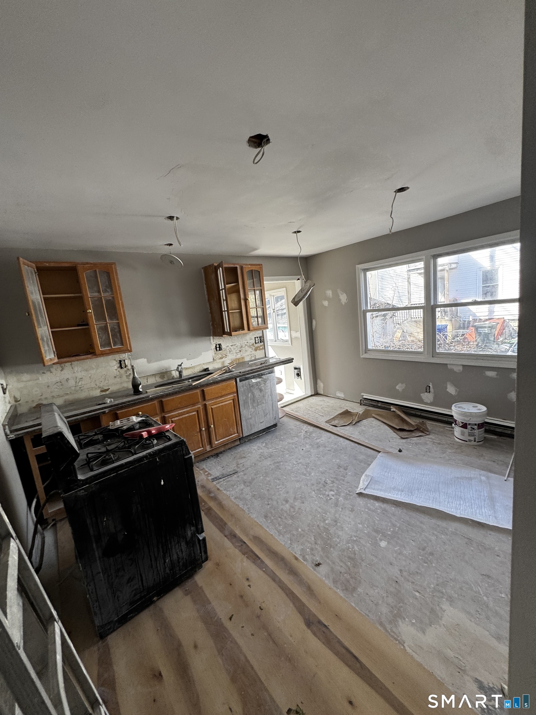 157 Anson Street Bridgeport, CT 06606 - Photo 3 of 5 a kitchen with a stove and a sink
