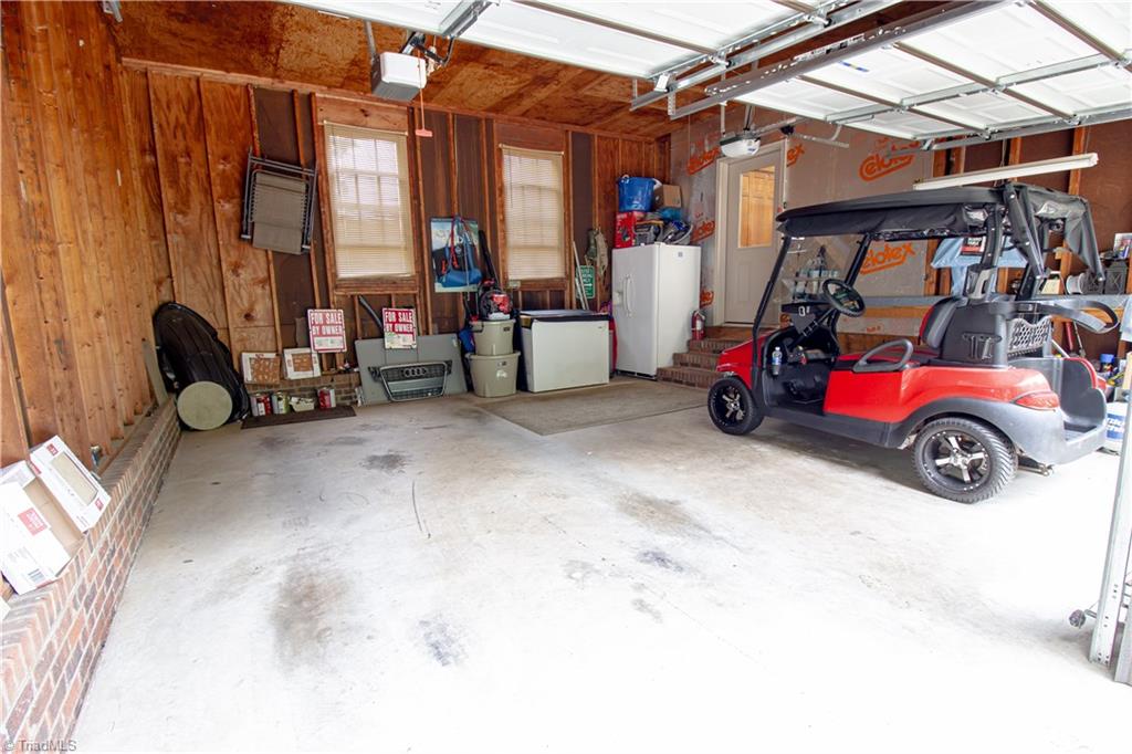 325 South Edgewood Road Eden, NC 27288 - Photo 23 of 29 double garage with attic stairs for storage