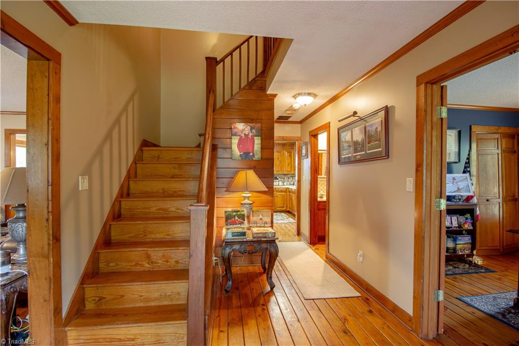325 South Edgewood Road Eden, NC 27288 - Photo 6 of 29 foyer, beautiful wood flooring throughout main level