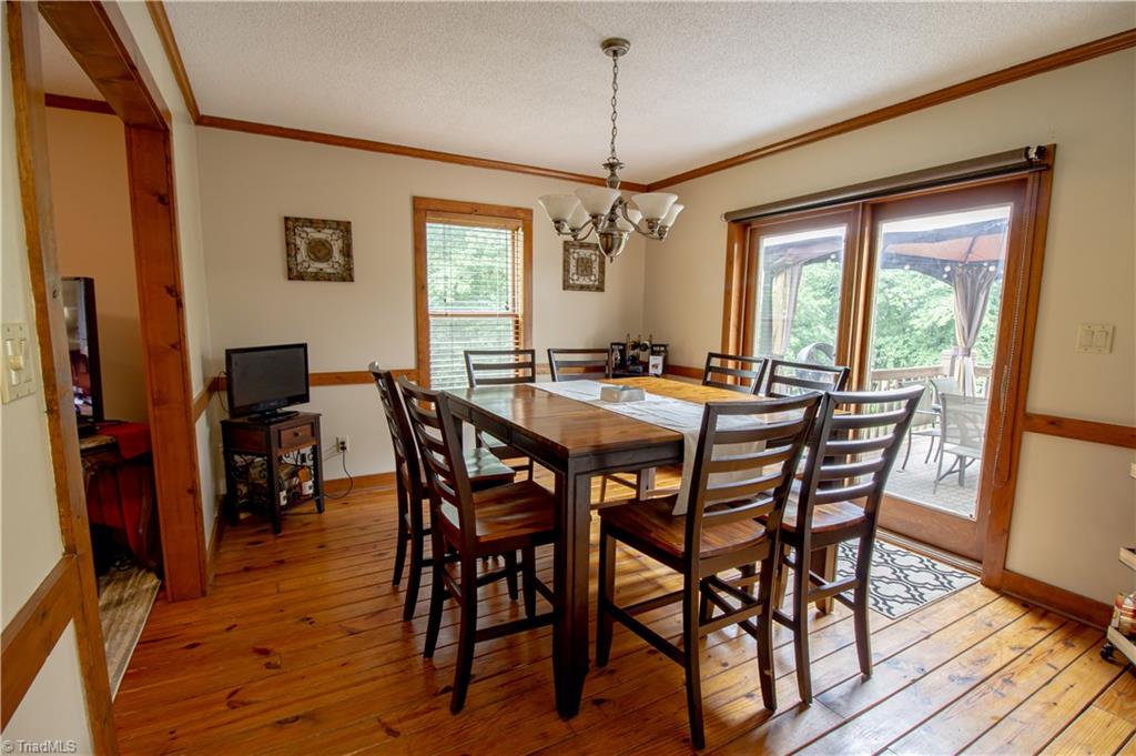 325 South Edgewood Road Eden, NC 27288 - Photo 10 of 29 large dining room with patio doors out to deck