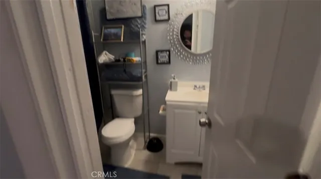 a bathroom with a toilet and a sink