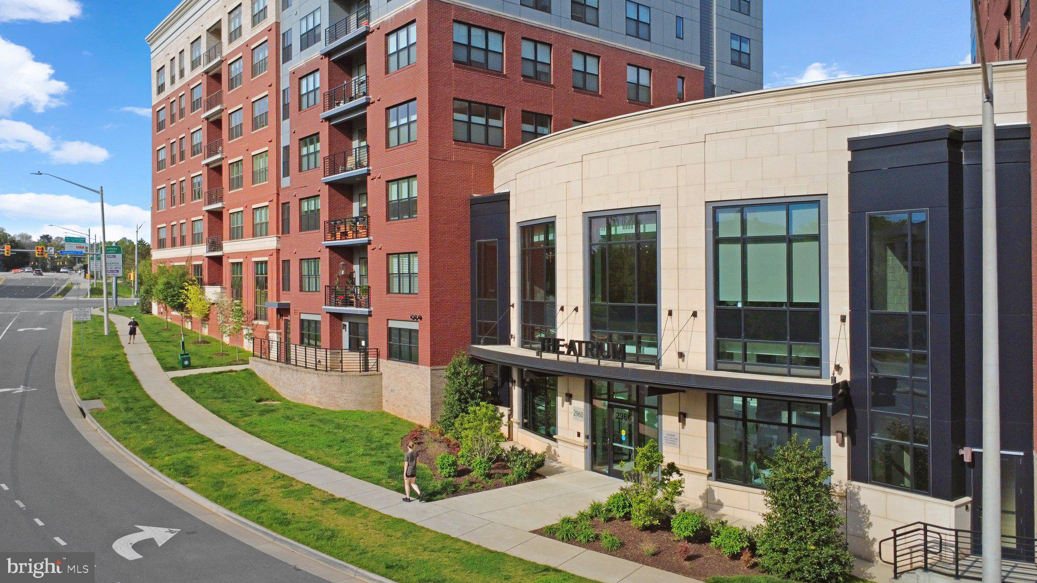 2960 Vaden Drive, Unit 2312 Fairfax, VA 22031 - Photo 2 of 46 front view of a building with a garden
