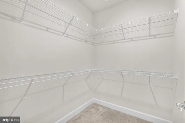 a view of a room with racks on the wall