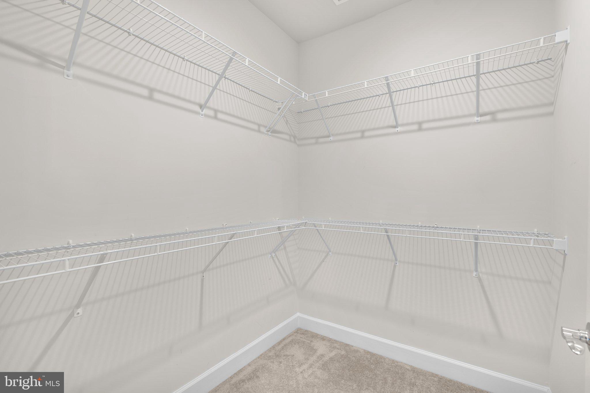 2960 Vaden Drive, Unit 2312 Fairfax, VA 22031 - Photo 29 of 46 a view of a room with racks on the wall