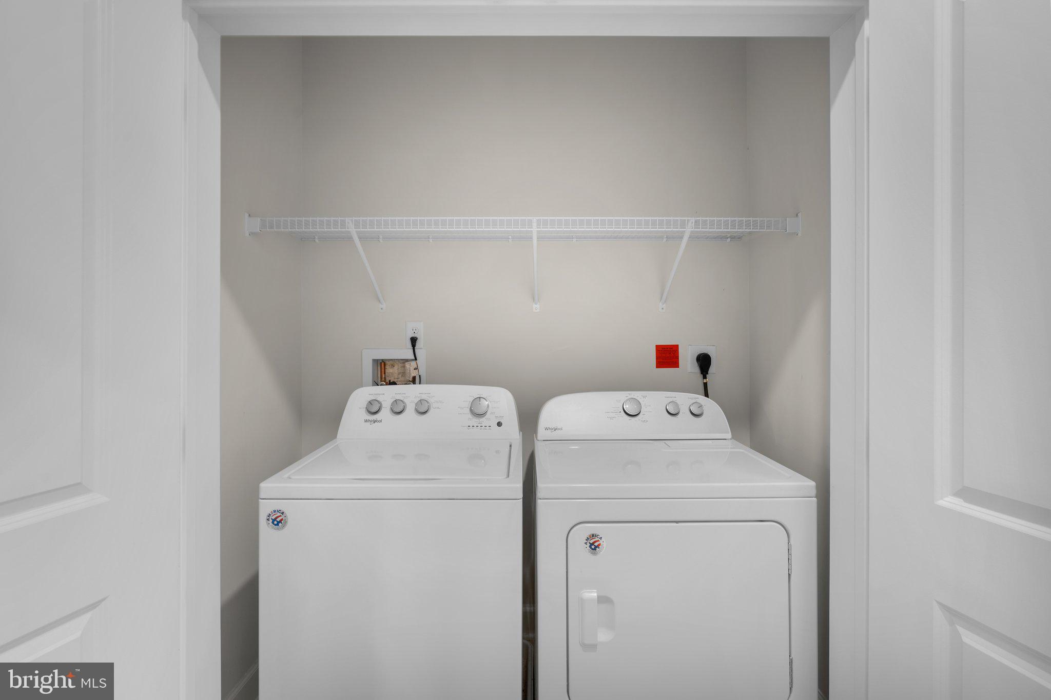 2960 Vaden Drive, Unit 2312 Fairfax, VA 22031 - Photo 36 of 46 a utility room with dryer and washer