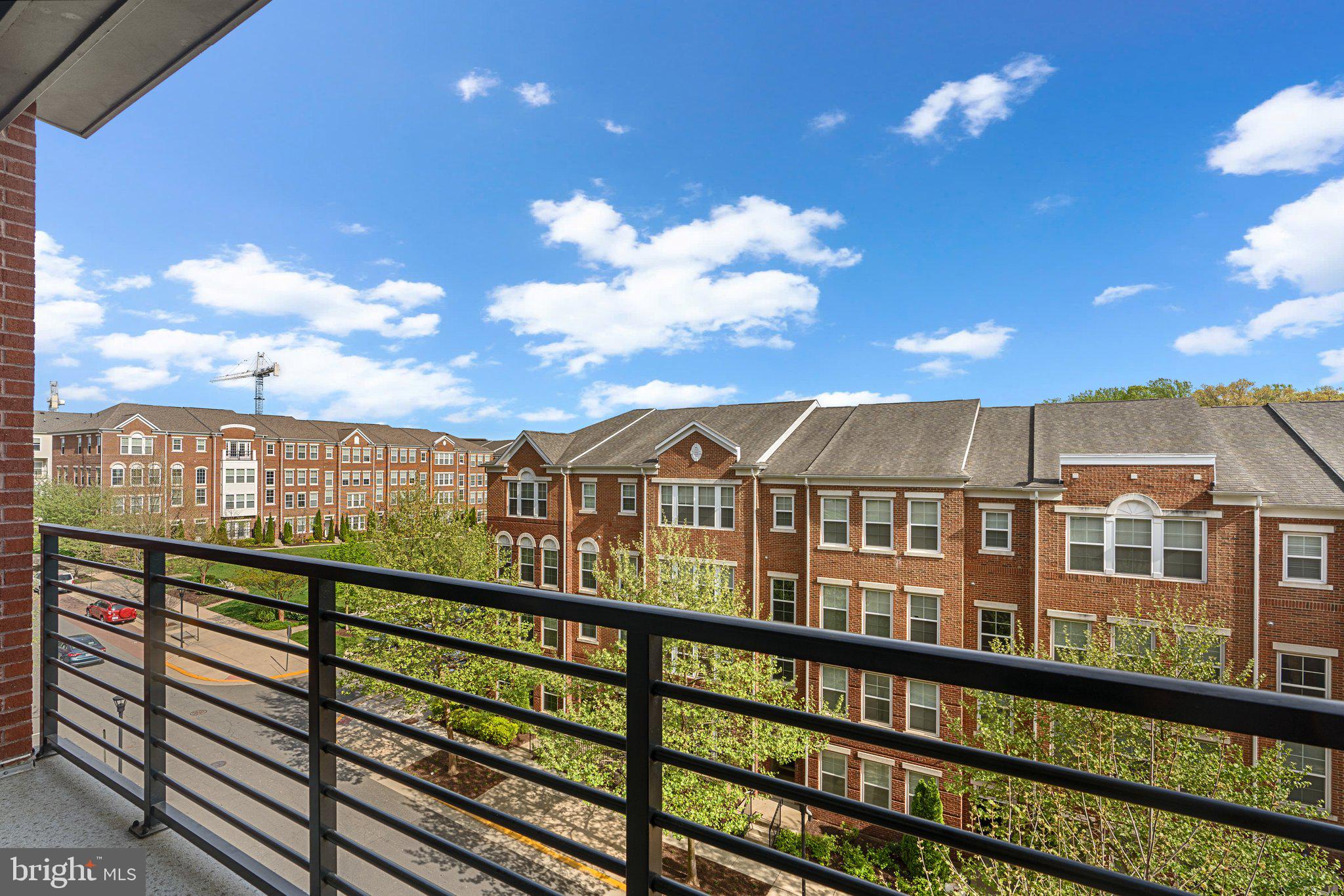 2960 Vaden Drive, Unit 2312 Fairfax, VA 22031 - Photo 37 of 46 a view of a large building from a balcony