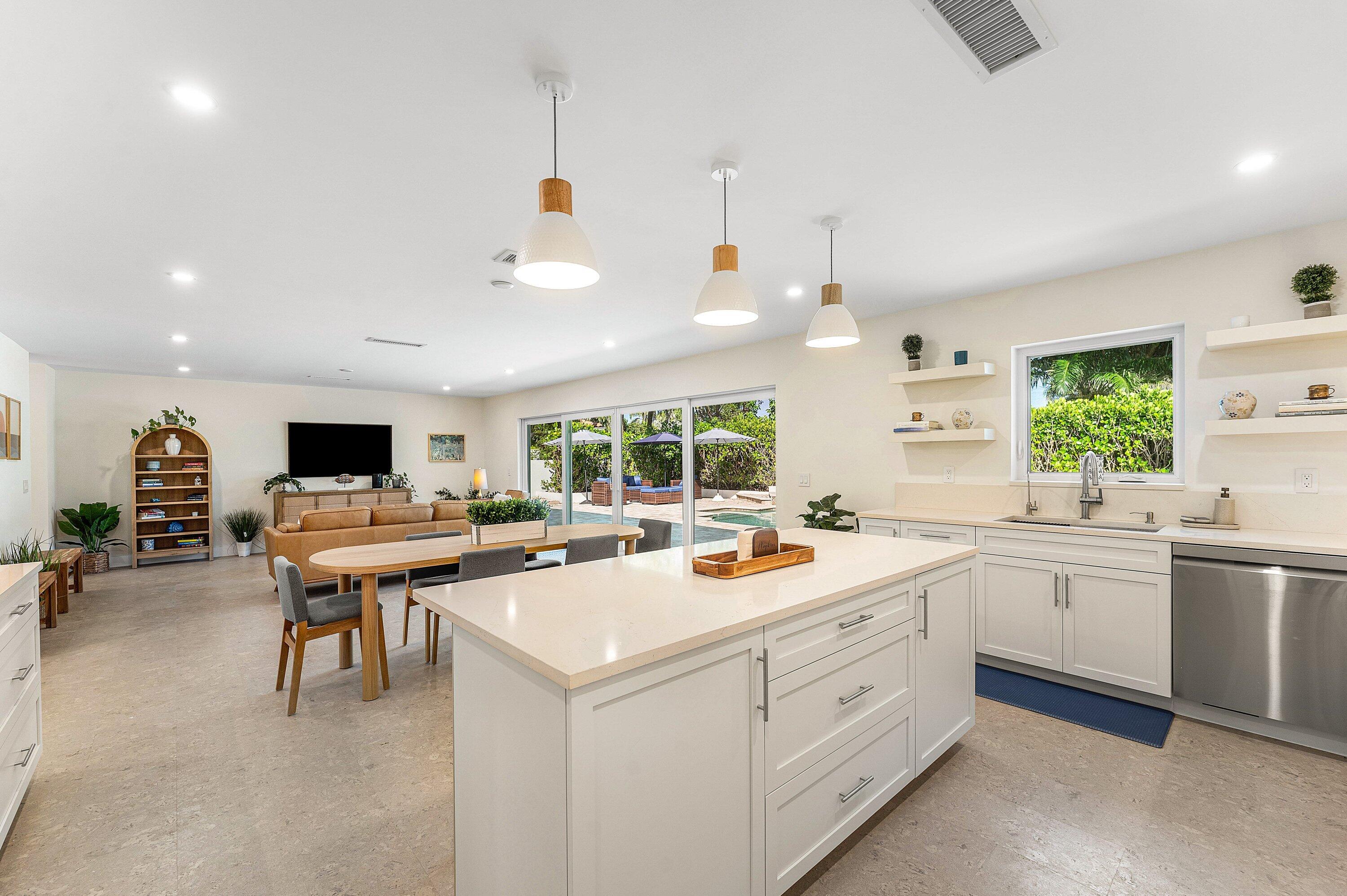 1070 Marble Way Boca Raton, FL 33432 - Photo 13 of 39 a view of a kitchen and living room