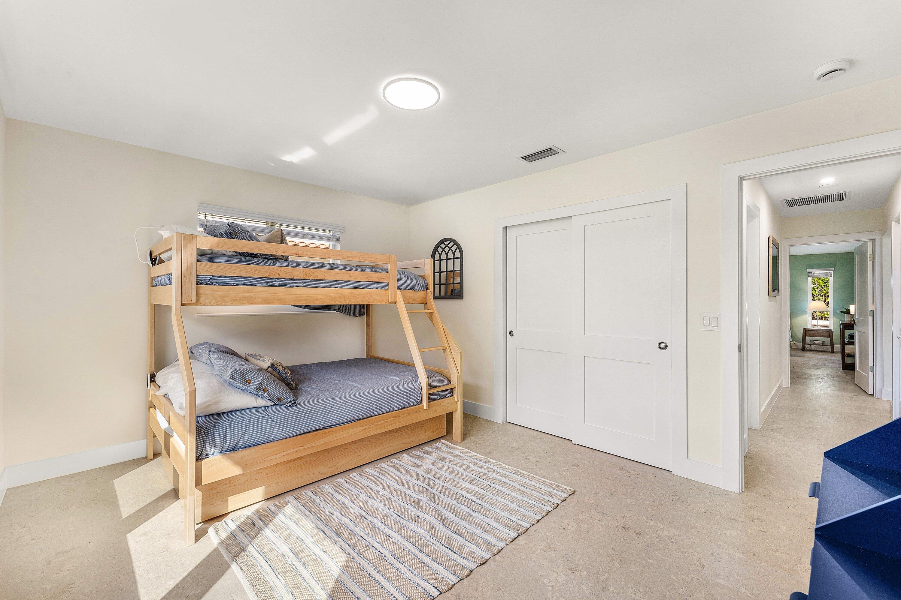 1070 Marble Way Boca Raton, FL 33432 - Photo 25 of 39 a bedroom with furniture and a wooden floor