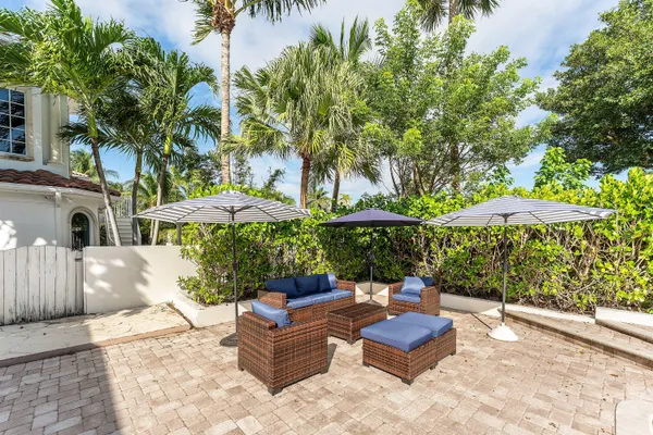 a outdoor space with patio lots of furniture and plants