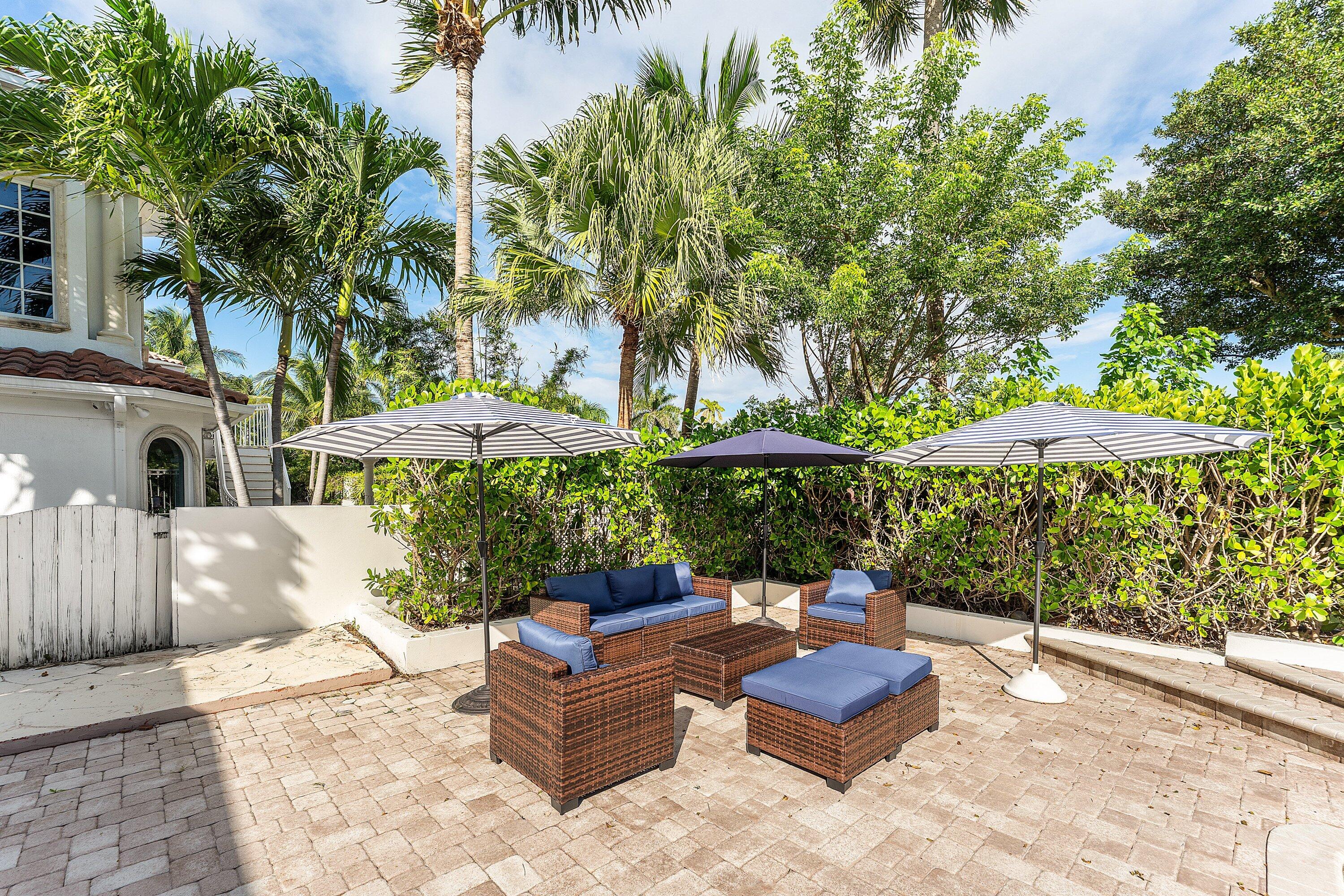 1070 Marble Way Boca Raton, FL 33432 - Photo 29 of 39 a outdoor space with patio lots of furniture and plants