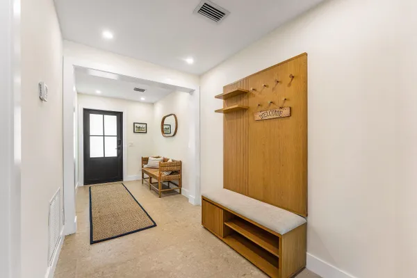 a room with furniture and a window