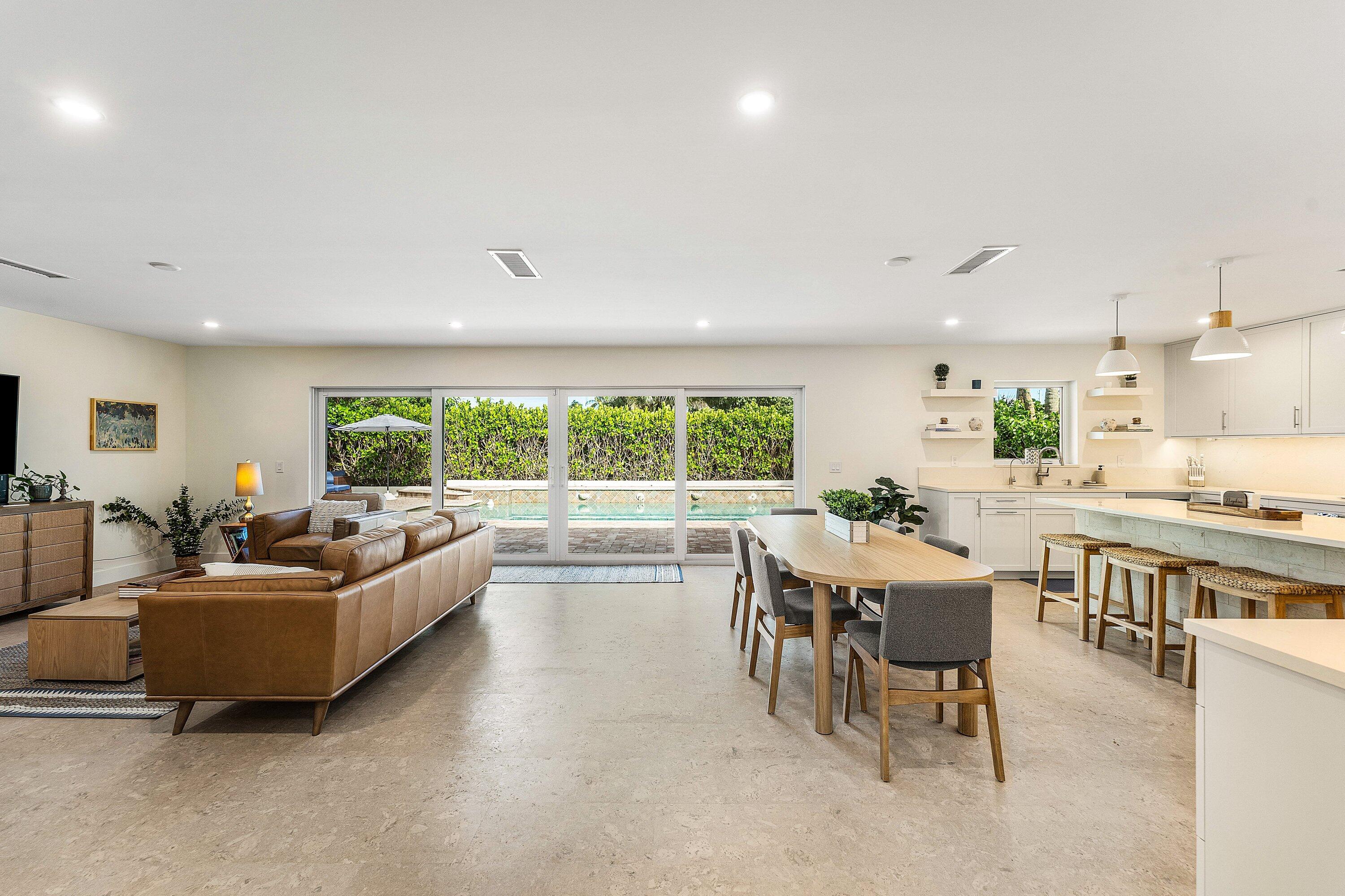 1070 Marble Way Boca Raton, FL 33432 - Photo 6 of 39 a living room with furniture and a large window