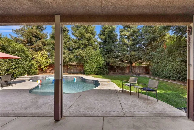 a view of backyard with green space