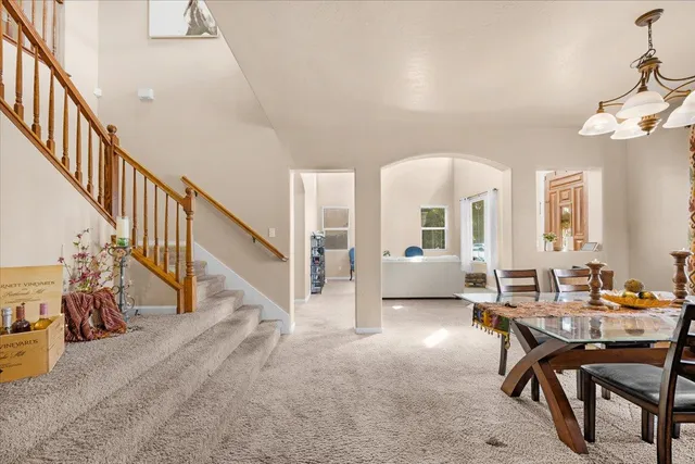 a workspace with wooden floor and windows