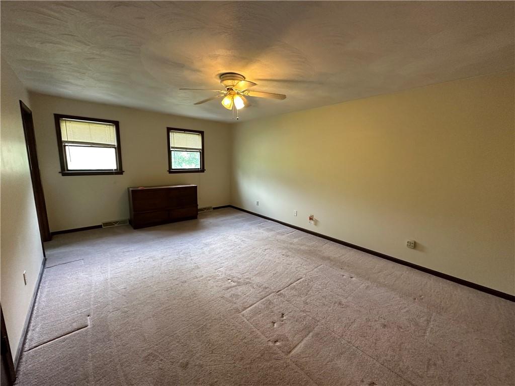 2646 Hood School Road Indiana, PA 15701 - Photo 8 of 21 an empty room with windows and fan view