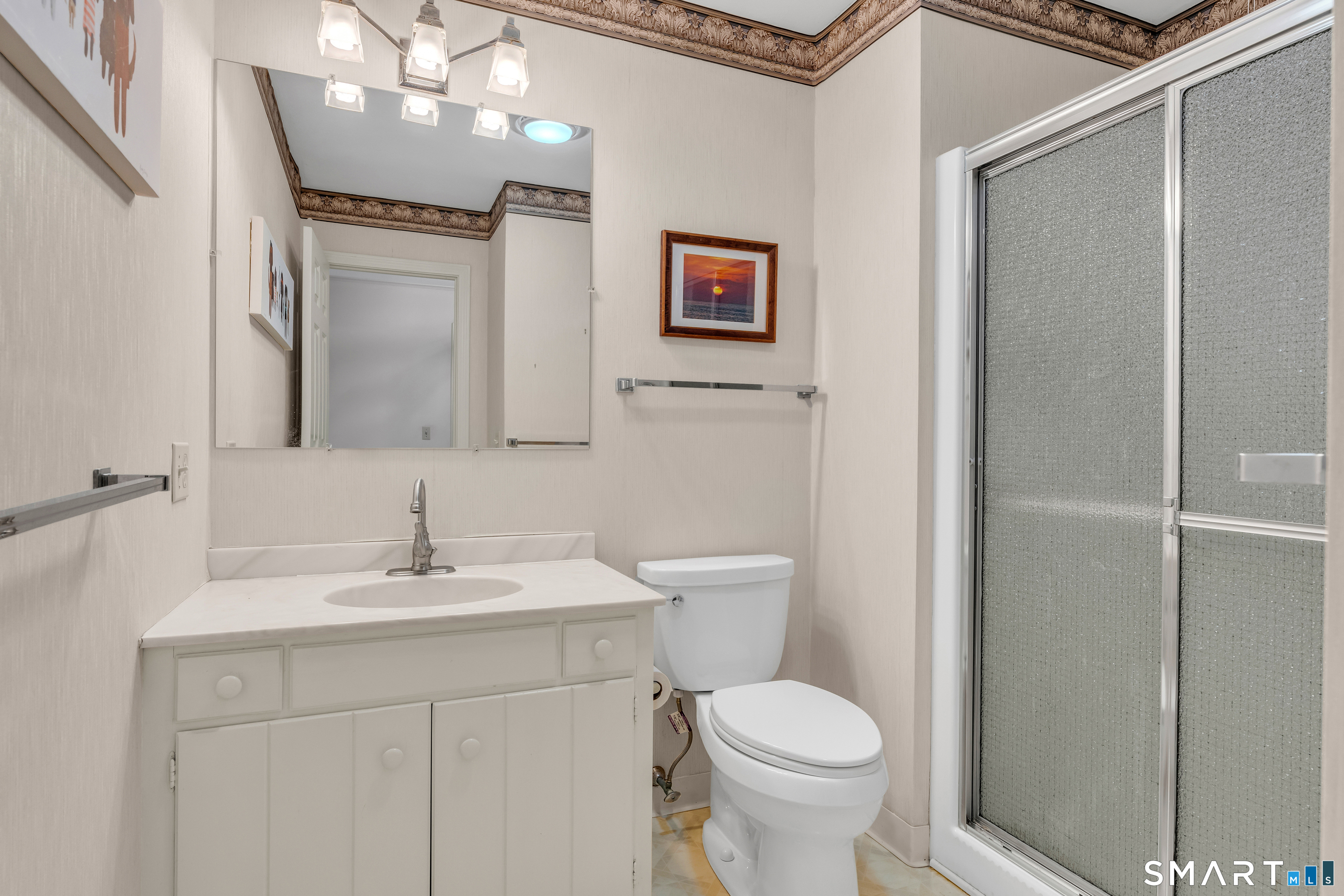 23 Hampshire Road, Unit 23 Madison, CT 06443 - Photo 32 of 39 Hallway full bath to support other two rooms on the second floor