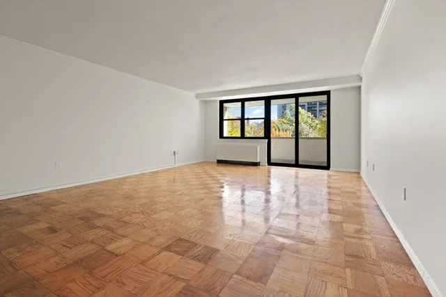 a view of a garden from a balcony