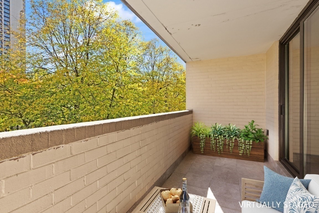 2 Hawthorne Place, Unit 5H Boston, MA 02114 - Photo 10 of 21 a view of a garden from a balcony