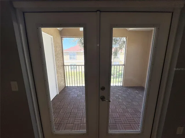a view of entryway with a front door