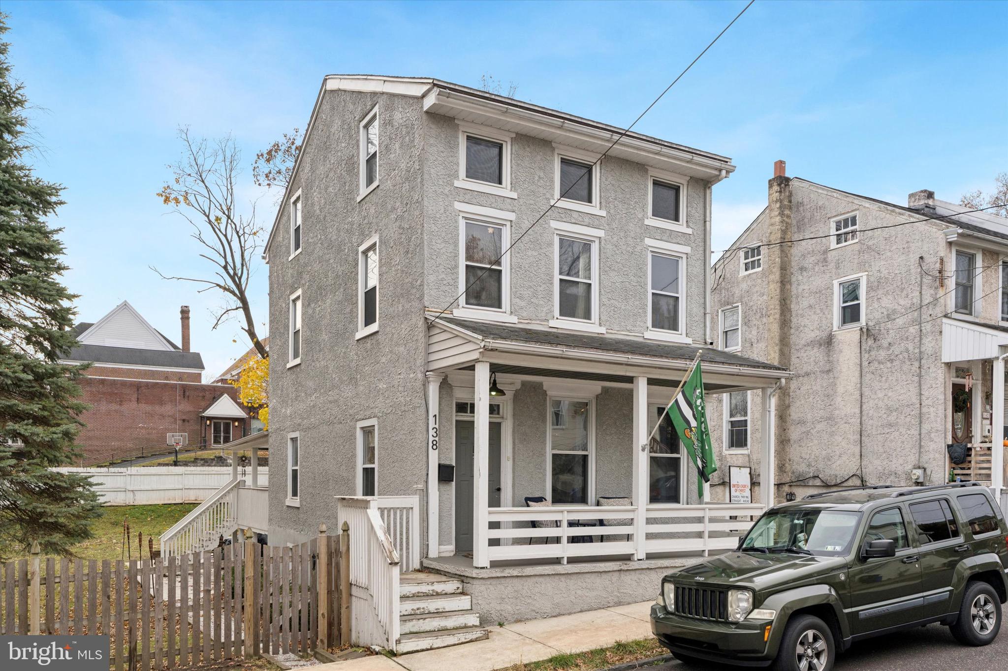 a car parked in front of a building