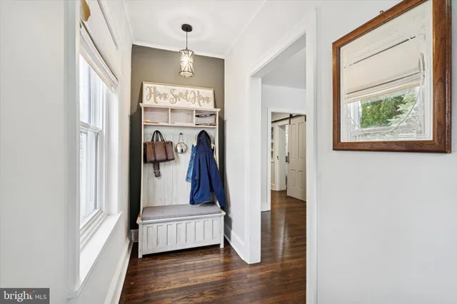 a view of living room with furniture and a window