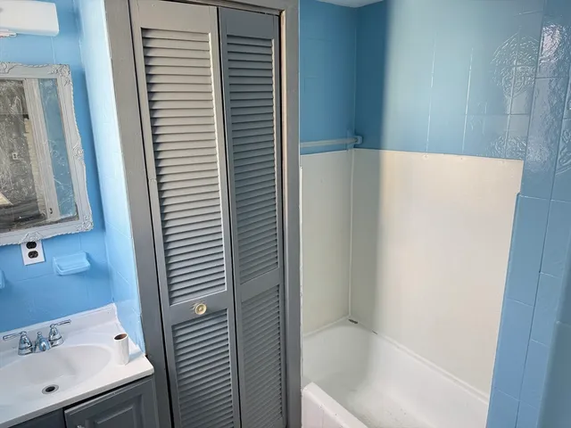 a bathroom with a bathtub