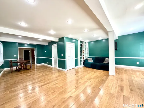 a kitchen with stainless steel appliances granite countertop a stove sink and cabinets