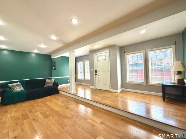 a view of a kitchen with a sink and cabinets