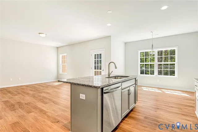 a bathroom with a sink double vanity and a mirror
