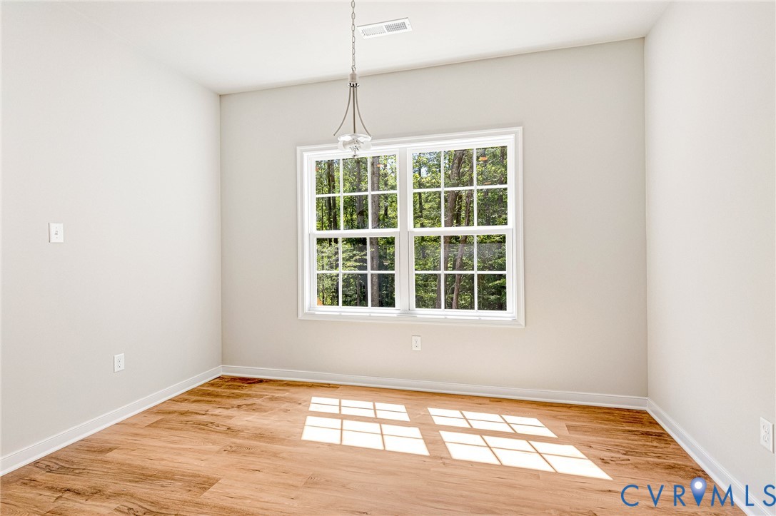 8355 Patrick Henry Boulevard Mechanicsville, VA 23116 - Photo 26 of 48 a view of an empty room with a window