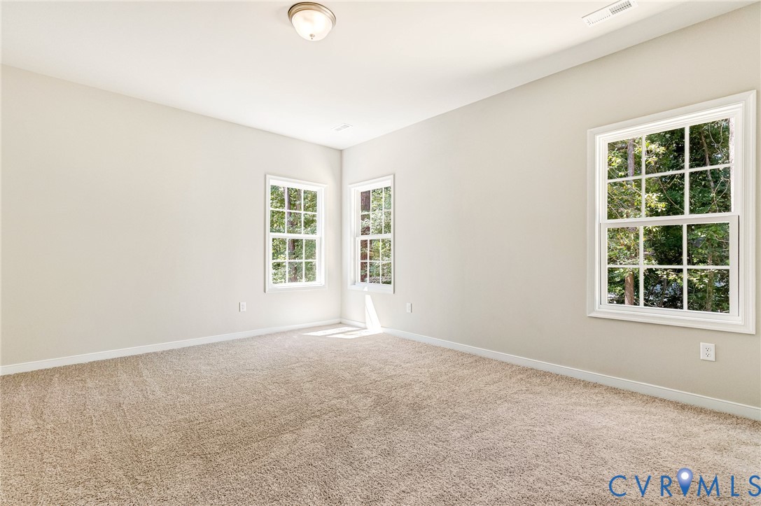 8355 Patrick Henry Boulevard Mechanicsville, VA 23116 - Photo 28 of 48 Primary Bedroom