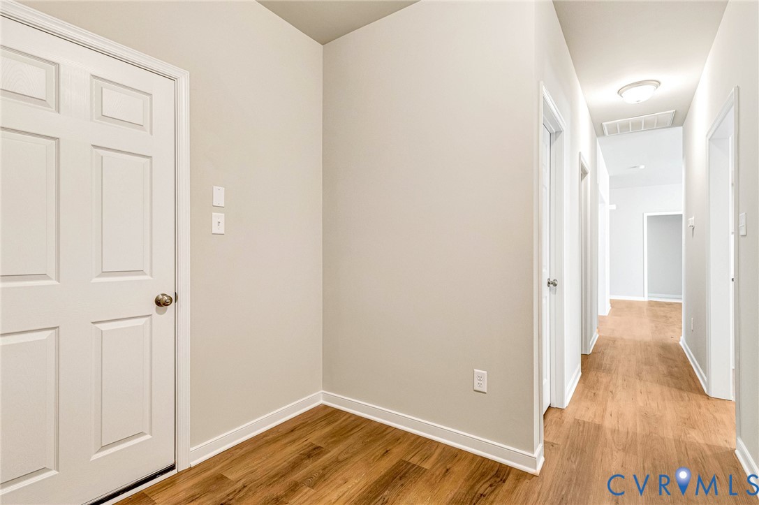 8355 Patrick Henry Boulevard Mechanicsville, VA 23116 - Photo 34 of 48 a view of a room with wooden floor