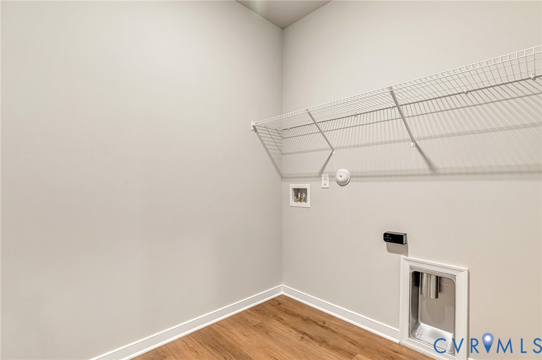 8355 Patrick Henry Boulevard Mechanicsville, VA 23116 - Photo 35 of 48 a view of a room with wooden floor