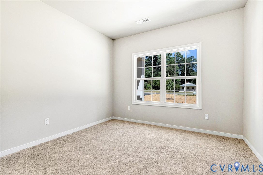 8355 Patrick Henry Boulevard Mechanicsville, VA 23116 - Photo 36 of 48 an empty room with a window