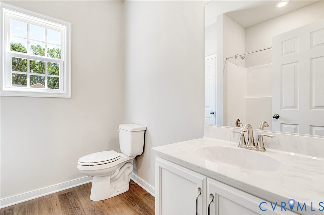8355 Patrick Henry Boulevard Mechanicsville, VA 23116 - Photo 37 of 48 a bathroom with a sink and a toilet