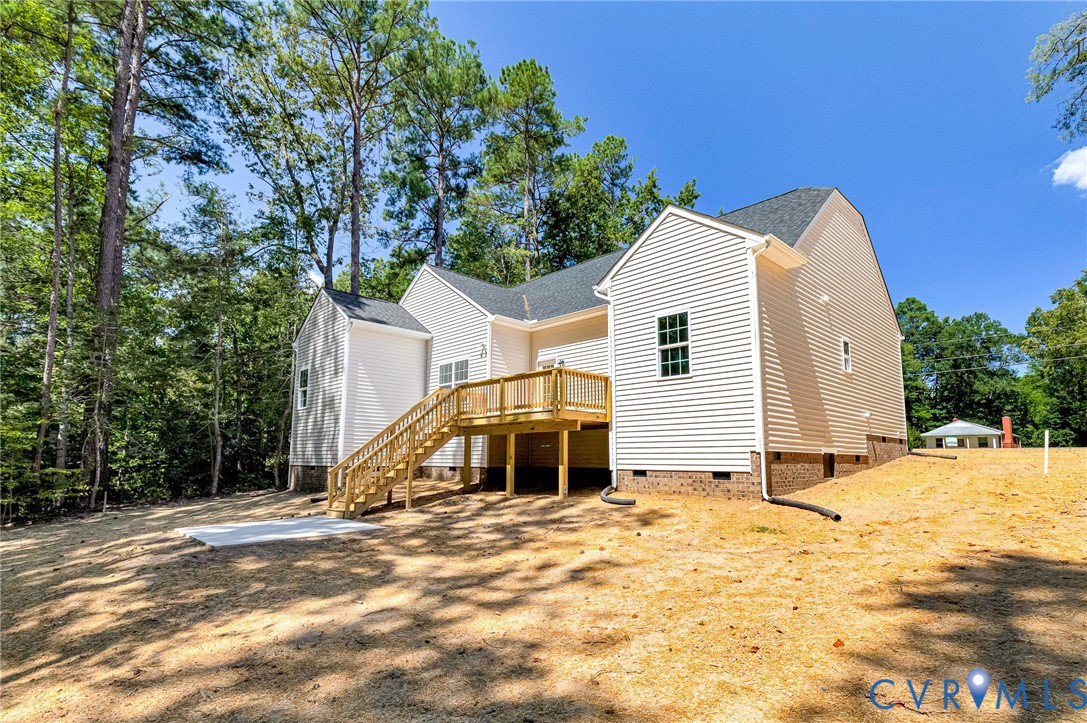 8355 Patrick Henry Boulevard Mechanicsville, VA 23116 - Photo 4 of 48 a view of a house with a yard and large tree
